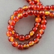 Glaskraal, rond 8mm, crackle rood-oranje, per 20st of per streng