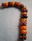 Handgemaakte glaskralen, oranje kobaltblauw en geel